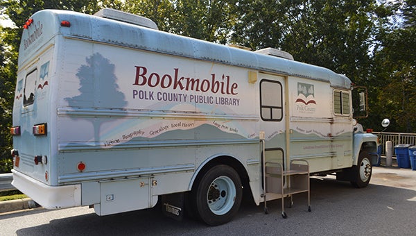 Polk County commissioners approved a resolution Monday night to donate the Polk County Public Library’s Bookmobile to Growing Rural Opportunities for the first mobile farmers market in Polk County and western North Carolina. The bus, which has been operational for 24 years, will be outfitted with a refrigerator, repaired generator and freezer for local food and McLendon expects the mobile market to be operational by January. (Photo by Michael O’Hearn)