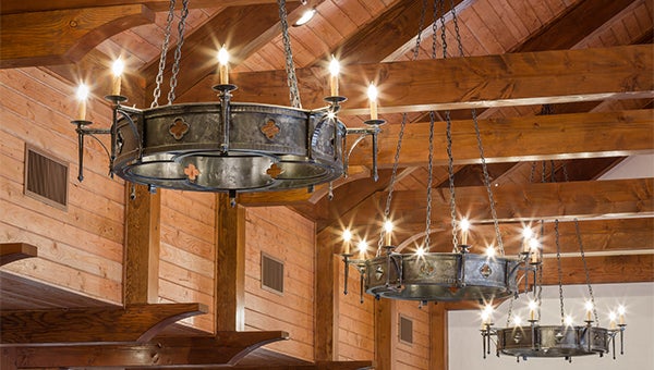 Custom-designed and hand-forged mild steel chandeliers for Glassy Mountain Community Church in Landrum, S.C., done by the Heirloom Companies. (photo courtesy The Heirloom Companies)